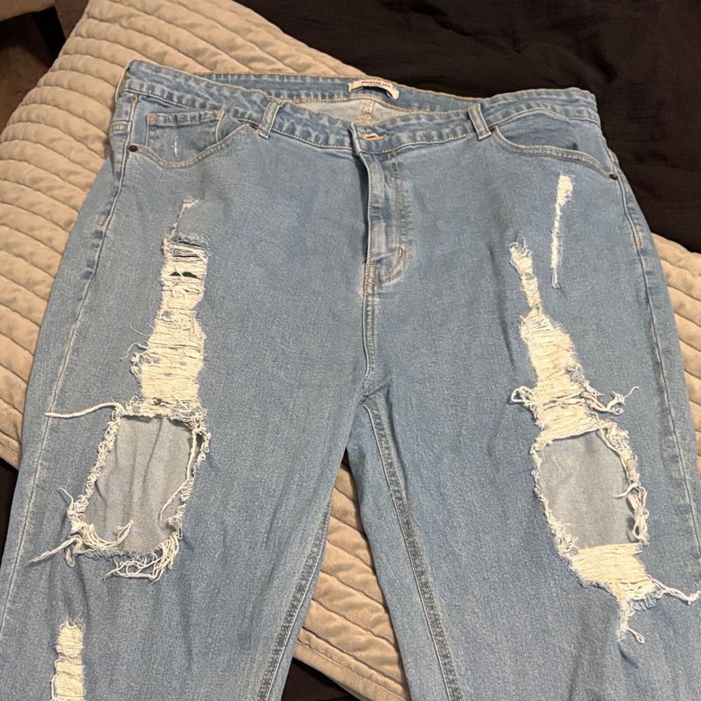 Distressed Light Blue Jeans
